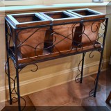 F30. Iron and copper plant stand. 
